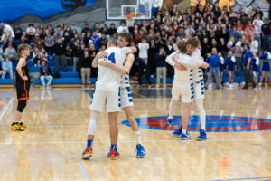 CHS Vikings celebrate their win over Post Falls to advance to state play
